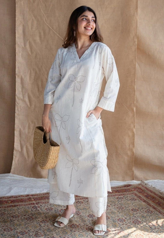 Elegant White Cotton Kurti with Subtle Floral Embroidery